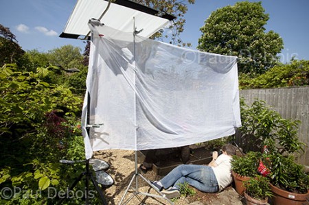 Paul Debois using large diffusers to soften midday sun