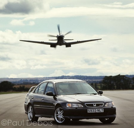 Spitfire flying over Honda Integra Type R