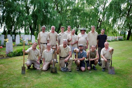 Team of War Graves Commission Gardeners at Le Trou Aide Poste Cemetery, near Lille, Northern France