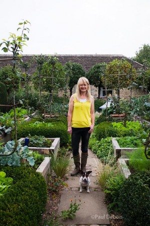 Bunny Guinness - Broadcaster, author and garden designer, with her dog