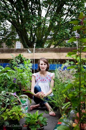 Helen Babbs, author, on her balcony in Central London